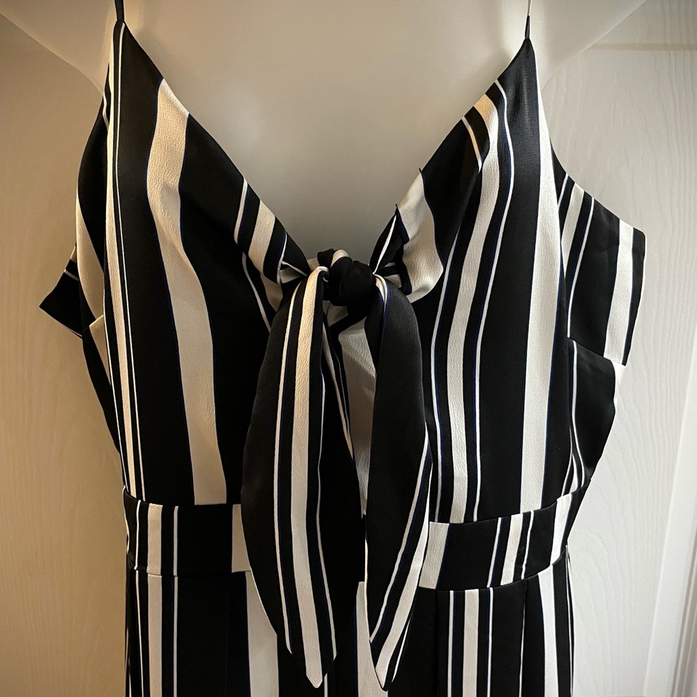 Striped flare legged jumpsuit. Size L.